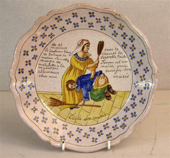 Appraisal: French faience plate late th century painted in coloured glazes