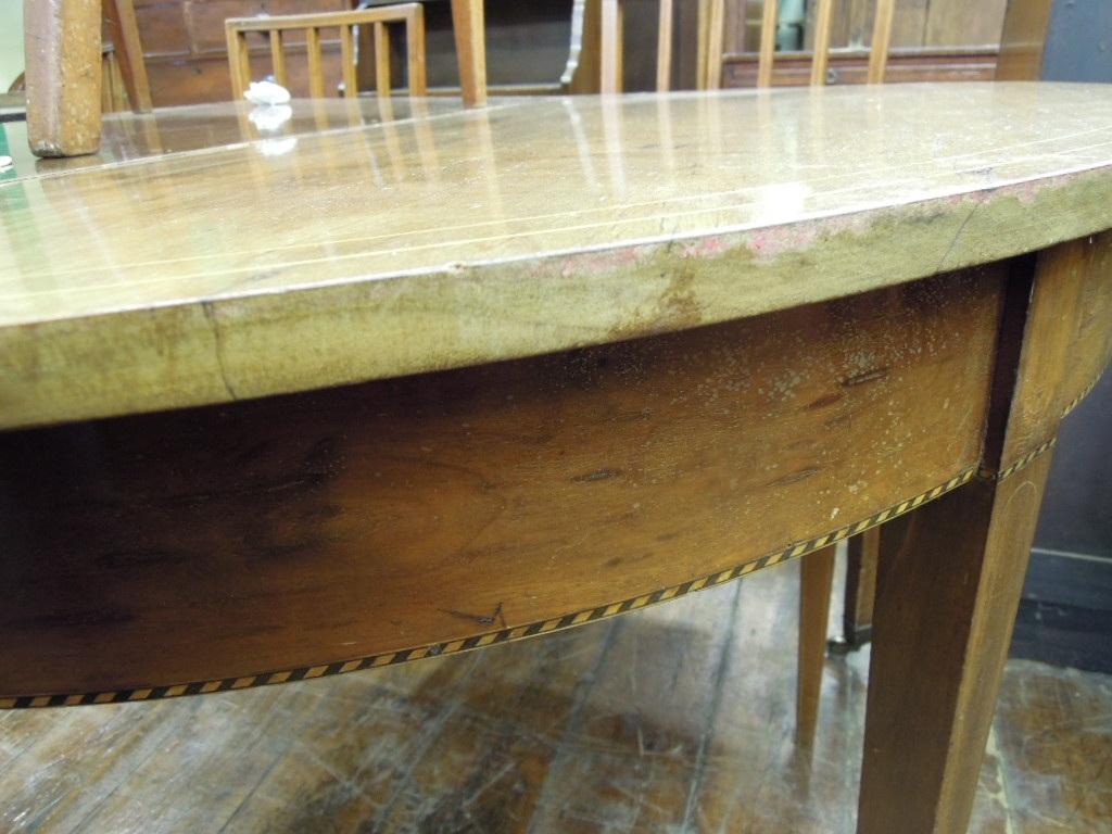 Appraisal: A Georgian style mahogany D end extending dining table with