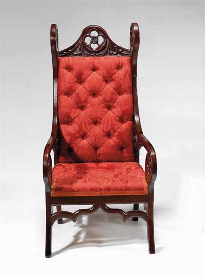 Appraisal: Walnut upholstered Gothic Revival armchair philadelphia - The crestrail and