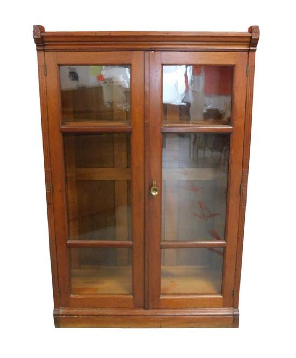 Appraisal: Eastlake cabinet bookcase with two glass panel doors late th