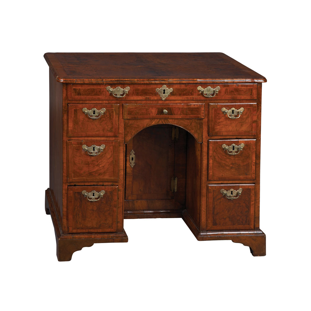 Appraisal: George II Featherbanded Walnut Kneehole Desk Mid th century The