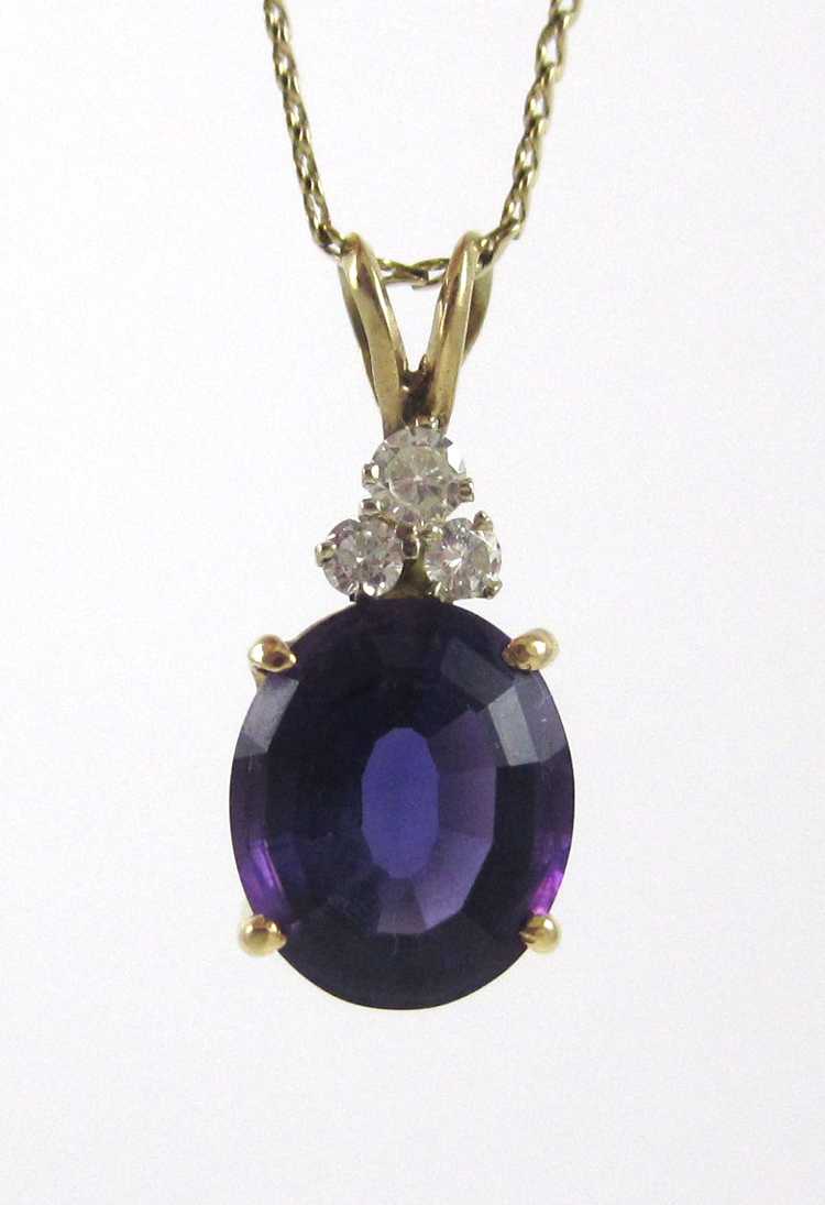 Appraisal: AMETHYST AND DIAMOND PENDANT NECKLACE suspended on a - inch