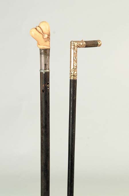 Appraisal: TWO SMALL WALKING STICKS One with carved heart form the