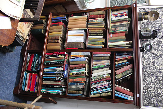 Appraisal: A MAHOGANY FLOOR STANDING OPEN BOOKCASE with two sets of