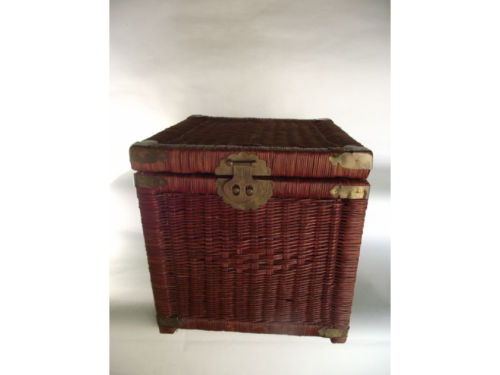 Appraisal: An eastern wicker work casket of squared form with applied