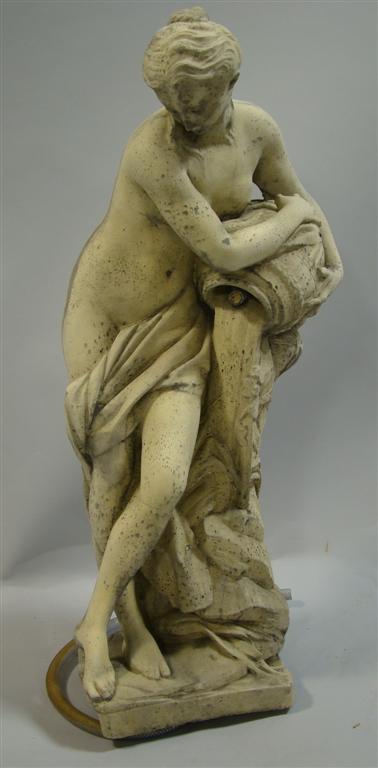 Appraisal: STONE GARDEN SCULPTURE OF FEMALE NUDE WITH JAR Modeled as