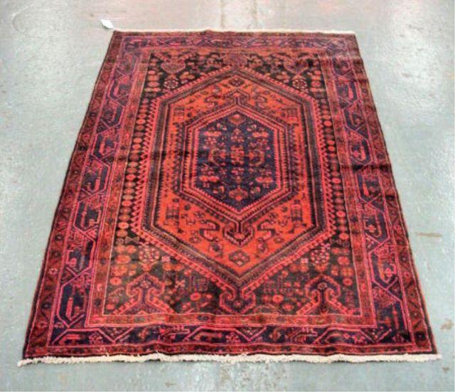 Appraisal: Persian Hamadan Carpet Reds blue and black From a Long