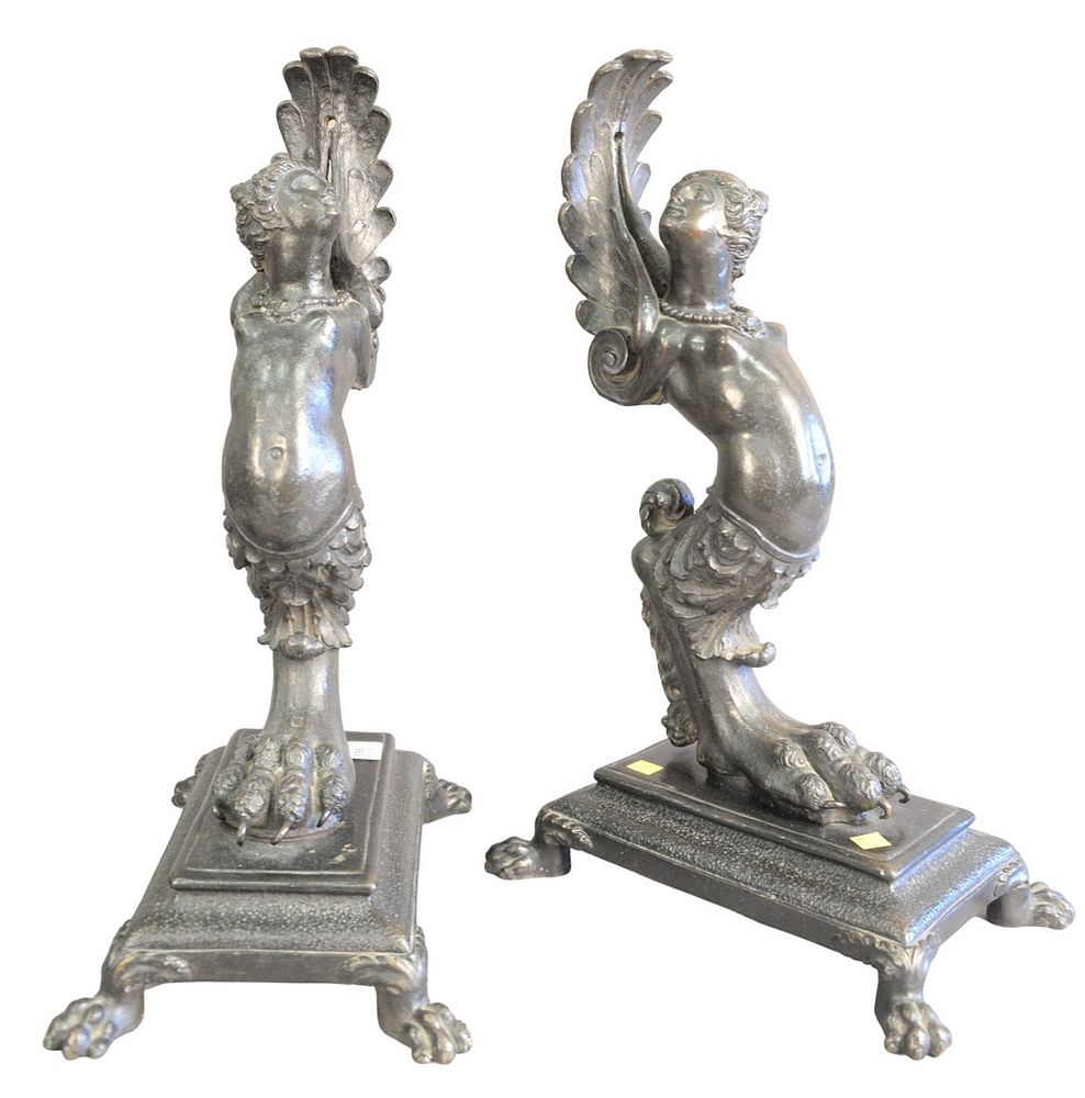 Appraisal: Pair of Iron Partially Clad Women on claw foot bases