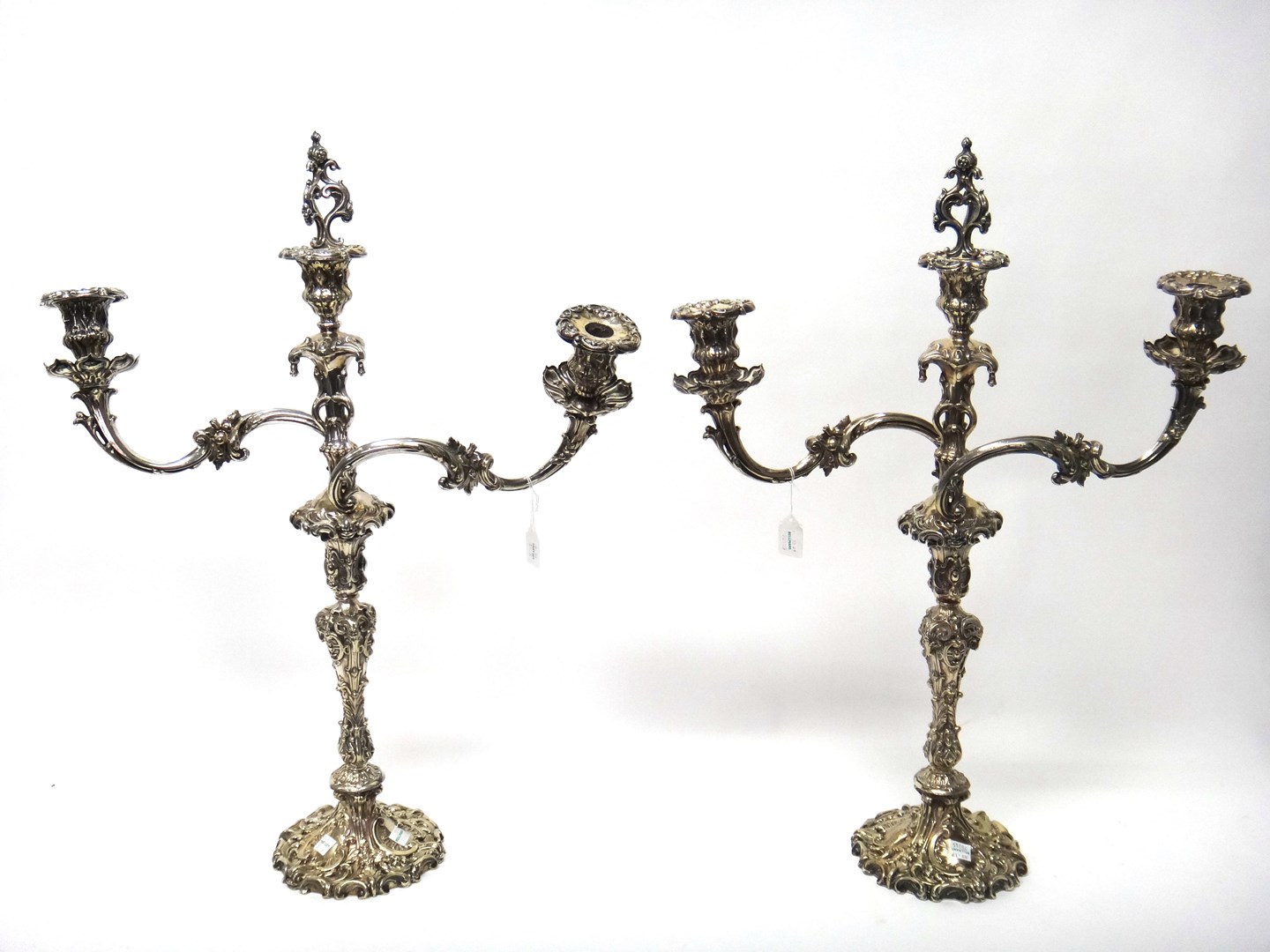 Appraisal: A pair of Victorian plated three light table candelabra in