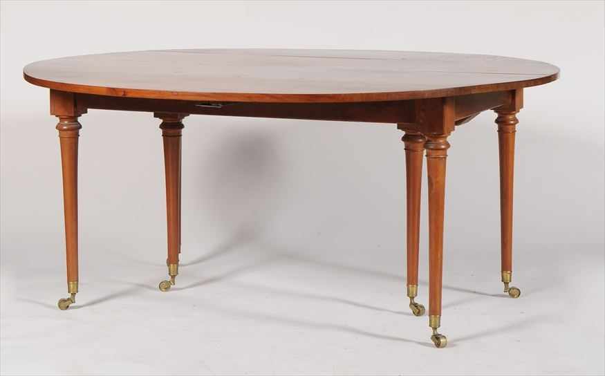 Appraisal: LATE LOUIS XVI STYLE WALNUT EXTENSION DINING TABLE With drop