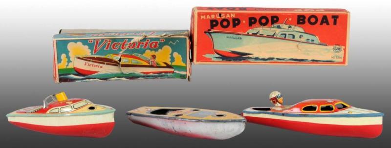 Appraisal: Lot of Pop-Pop Boats Description Two in their original boxes