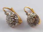 Appraisal: A pair of French hallmarked carat gold diamond earrings approx