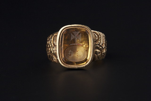 Appraisal: AN ANTIQUE CITRINE SIGNET RING the oval citrine intaglio collet