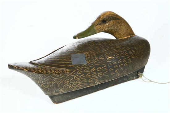 Appraisal: DECOY Canada th century Preening black duck Hollow with worn