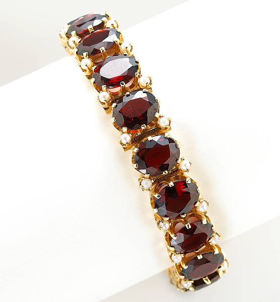 Appraisal: A garnet seed pearl and k gold bracelet weighing approximately