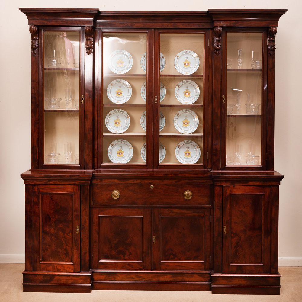 Appraisal: William IV Carved Mahogany Breakfront Bookcase In two parts the