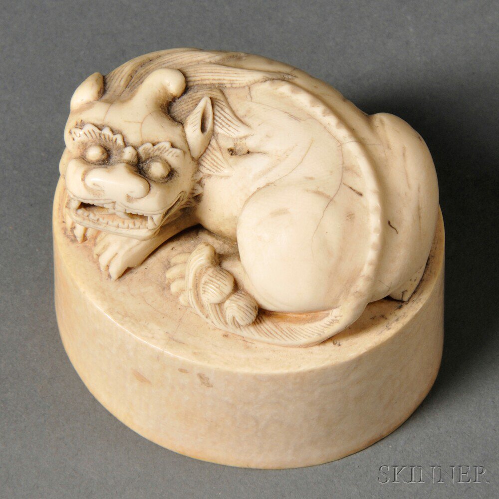 Appraisal: Ivory Seal with Lion China with carved six characters incised