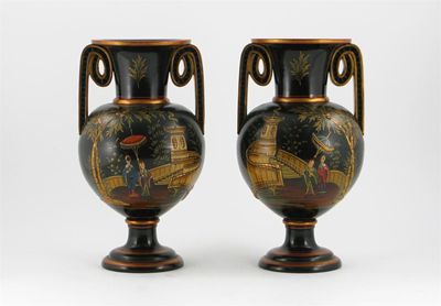 Appraisal: A pair of black lacquered pottery amphora vases each decorated