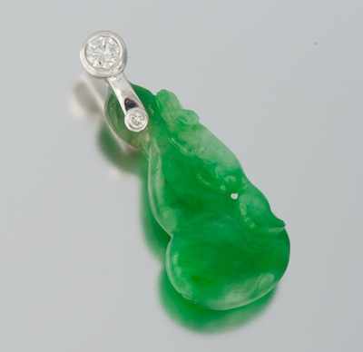 Appraisal: A Carved Jadeite and Diamond Pendant k white gold mounted