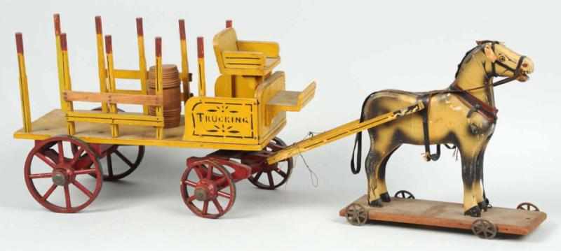 Appraisal: Early Horse-Drawn Trucking Wagon Toy American Stake-back wagon with one