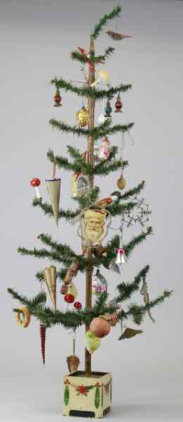 Appraisal: FULLY DECORATED GERMAN FEATHER TREE Early German feather tree on