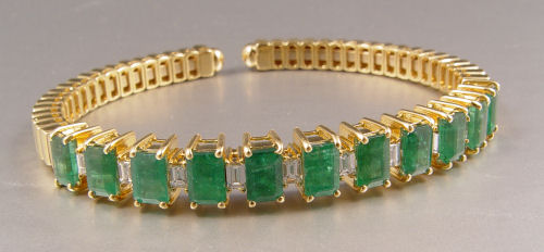 Appraisal: K EMERALD DIAMOND FLEX BRACELET K yellow gold flexible cuff