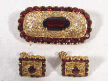 Appraisal: An carat gold garnet set brooch together with a matched