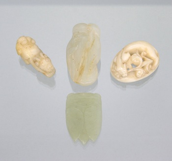 Appraisal: A Lot of Four Small Jade Carvings Lot includes a