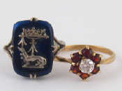 Appraisal: A French hallmarked silver ring with heraldic motif size L