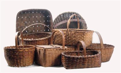 Appraisal: Group of eight splint baskets th century Comprising four round