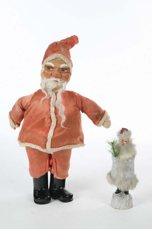 Appraisal: BELSNICKLE AND SANTA Paper mache belsnickle candy container in silver