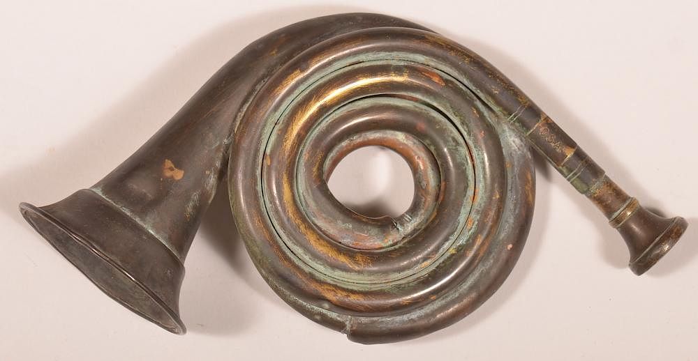 Appraisal: th Century Brass Bugle th Century Brass Bugle with attached