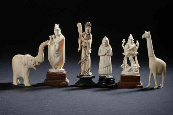 Appraisal: THREE INDIAN IVORY FIGURES Early th century Together with a