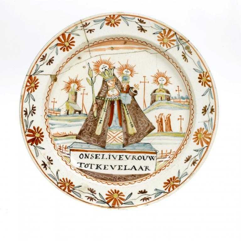 Appraisal: A STAFFORDSHIRE CREAMWARE PLATE enamelled in Holland with the shrine