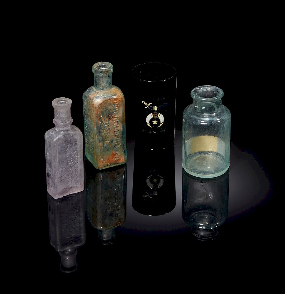 Appraisal: Antique Glass Bottles Lot of three glass items comprising a