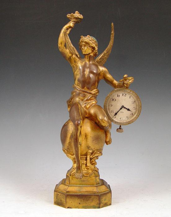 Appraisal: BRONZE FIGURAL CLOCK Figure of Mercury seated on globe Swiss