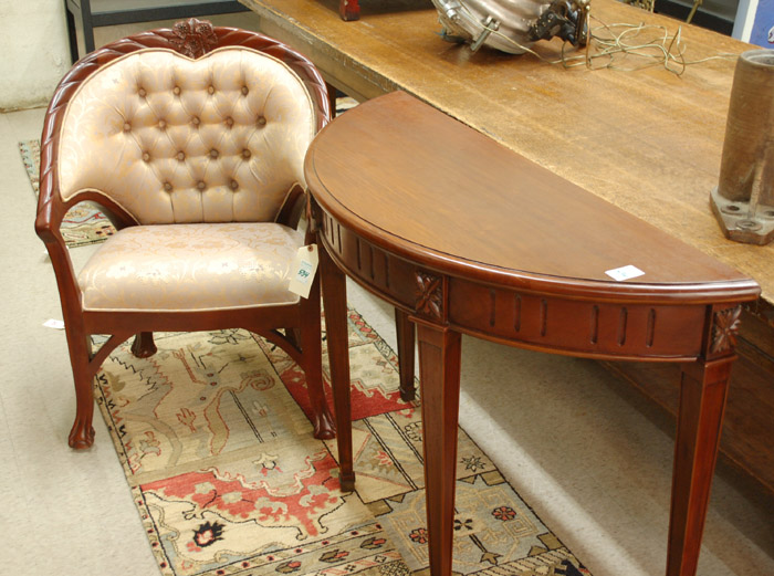 Appraisal: MAHOGANY CONSOLE TABLE AND ARMCHAIR Federal style demilune console table