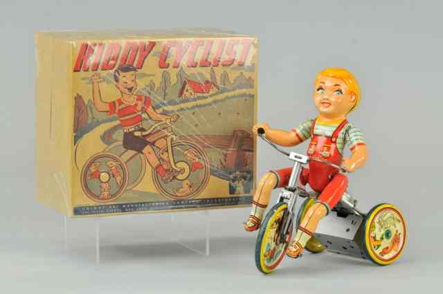 Appraisal: UNIQUE ART KIDDY CYCLIST IN ORIGINAL BOX Litho tin wind-up