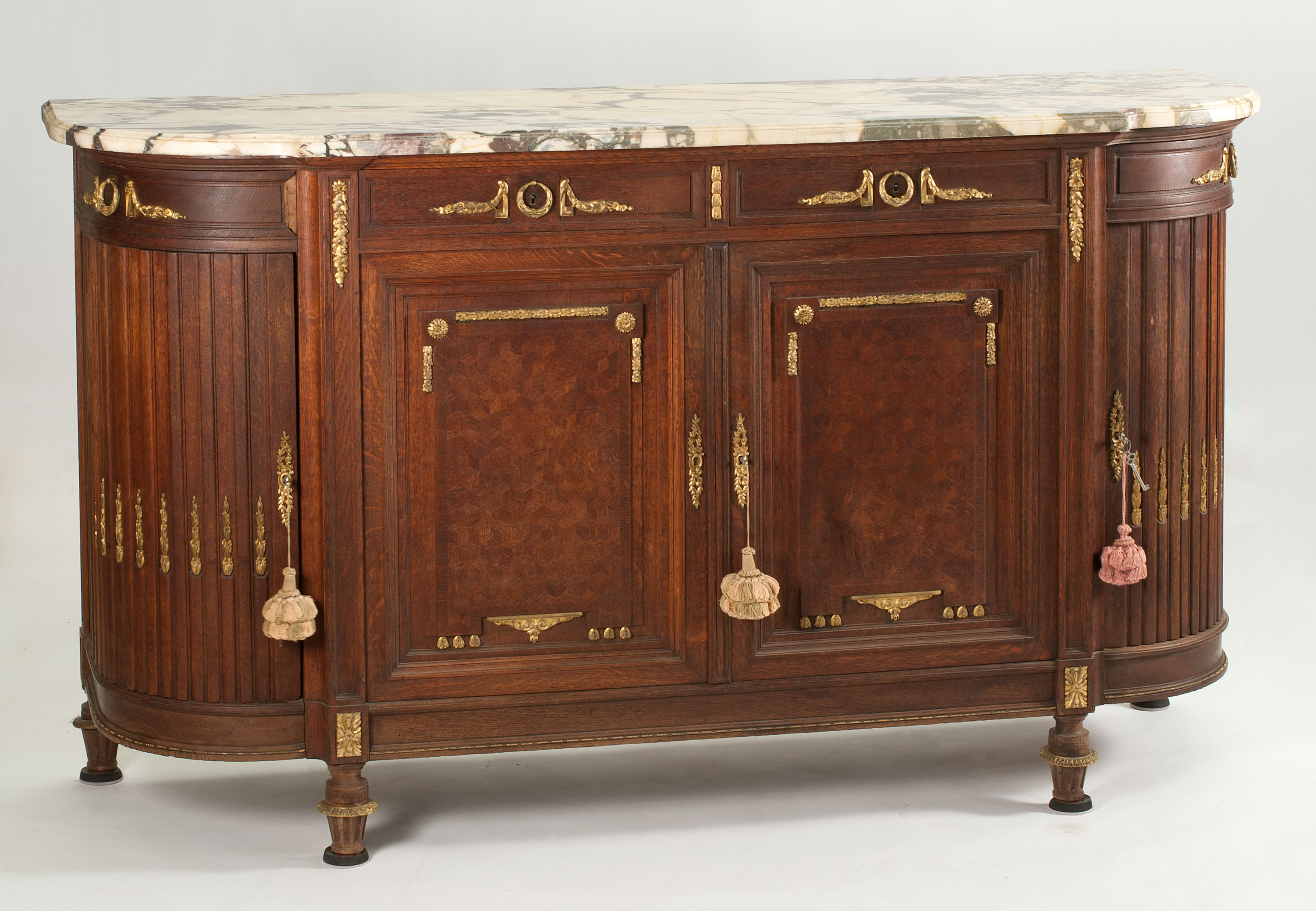 Appraisal: ORMOLU-MOUNTED MARBLE-TOP CREDENZA Early th CenturyIn Louis XVI style Fitted