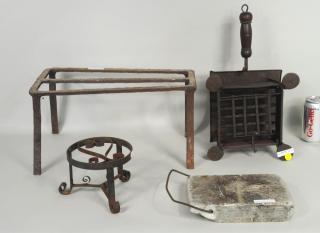 Appraisal: Four Fireplace Items Four fireplace items comprising a toaster two