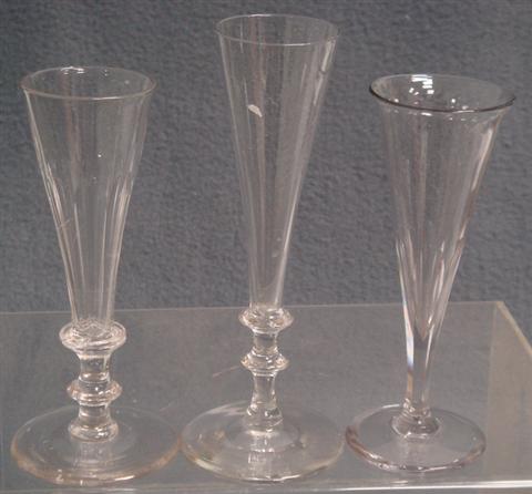 Appraisal: early handblown champagne flutes with faceted stems h Estimate -