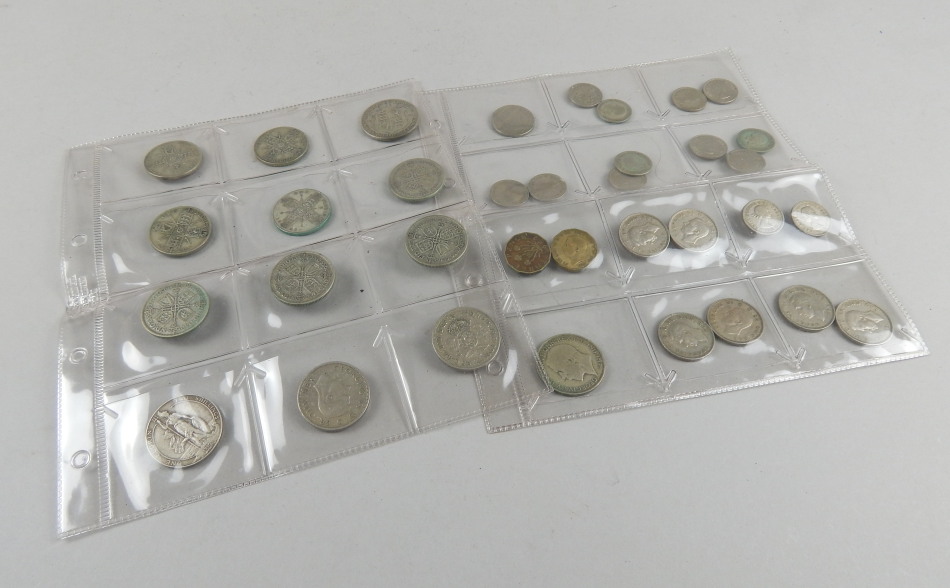 Appraisal: A quantity of British silver coins to include florins sixpences