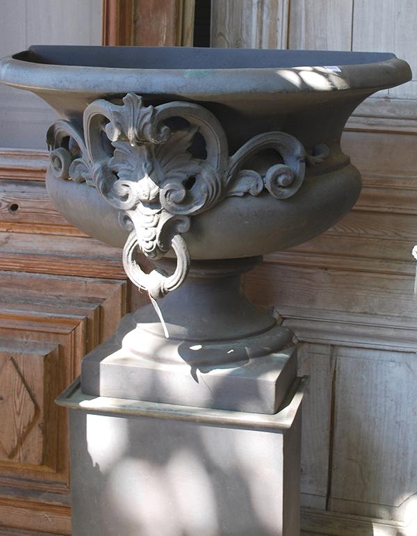 Appraisal: A BRONZE HALF CROSS URN ON STAND cast in cross-section