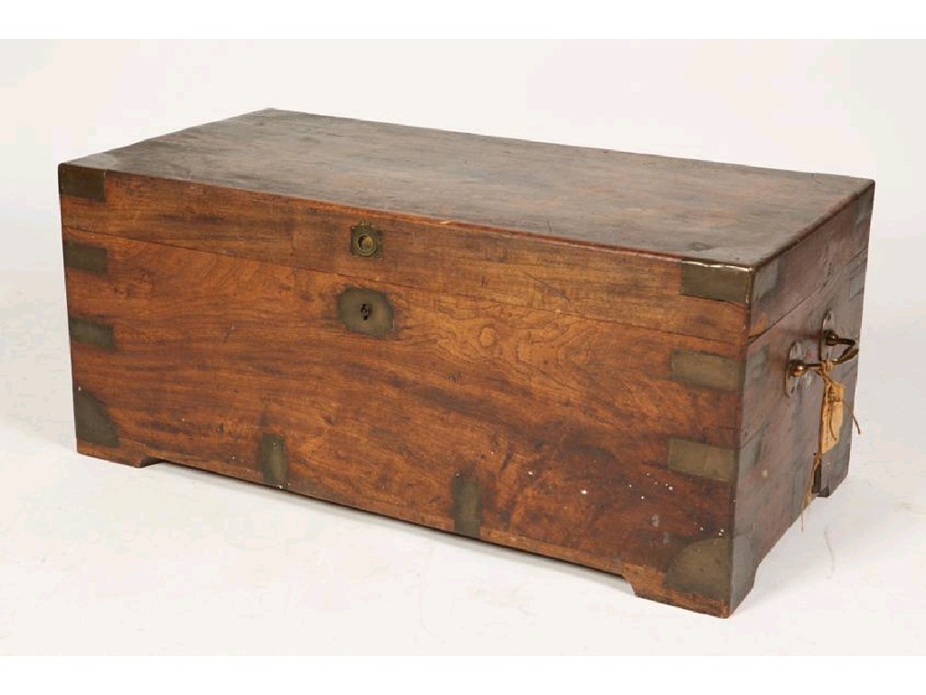 Appraisal: A TH CENTURY TEAK AND BRASS BOUND TRAVELLING TRUNK with