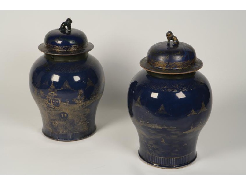 Appraisal: A PAIR OF CHINESE STORAGE VASES AND DOMED COVERS decorated