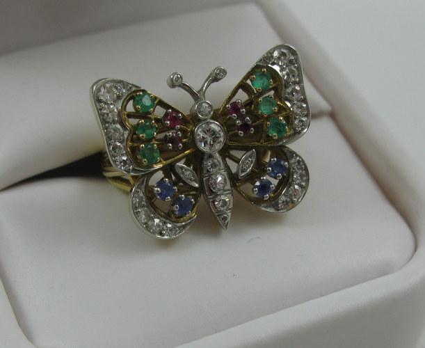 Appraisal: EIGHTEEN KARAT GOLD BUTTERFLY RING the butterfly figure faced with