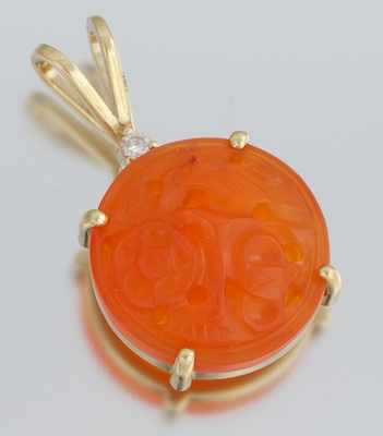 Appraisal: A Carved Orange Jade and Diamond Pendant k yellow gold