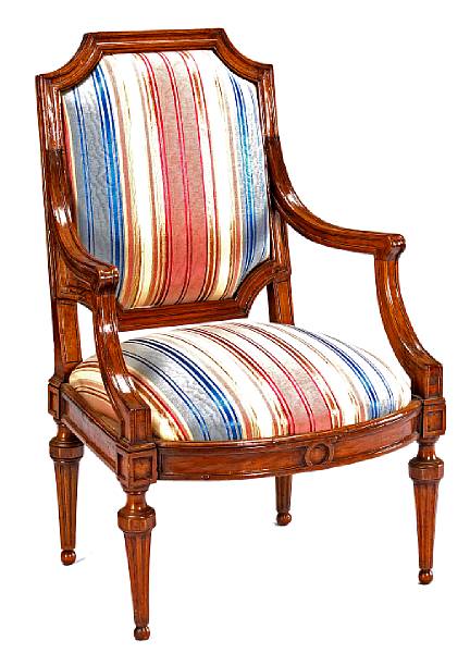 Appraisal: An Italian Neoclassical walnut armchair late th century The stepped