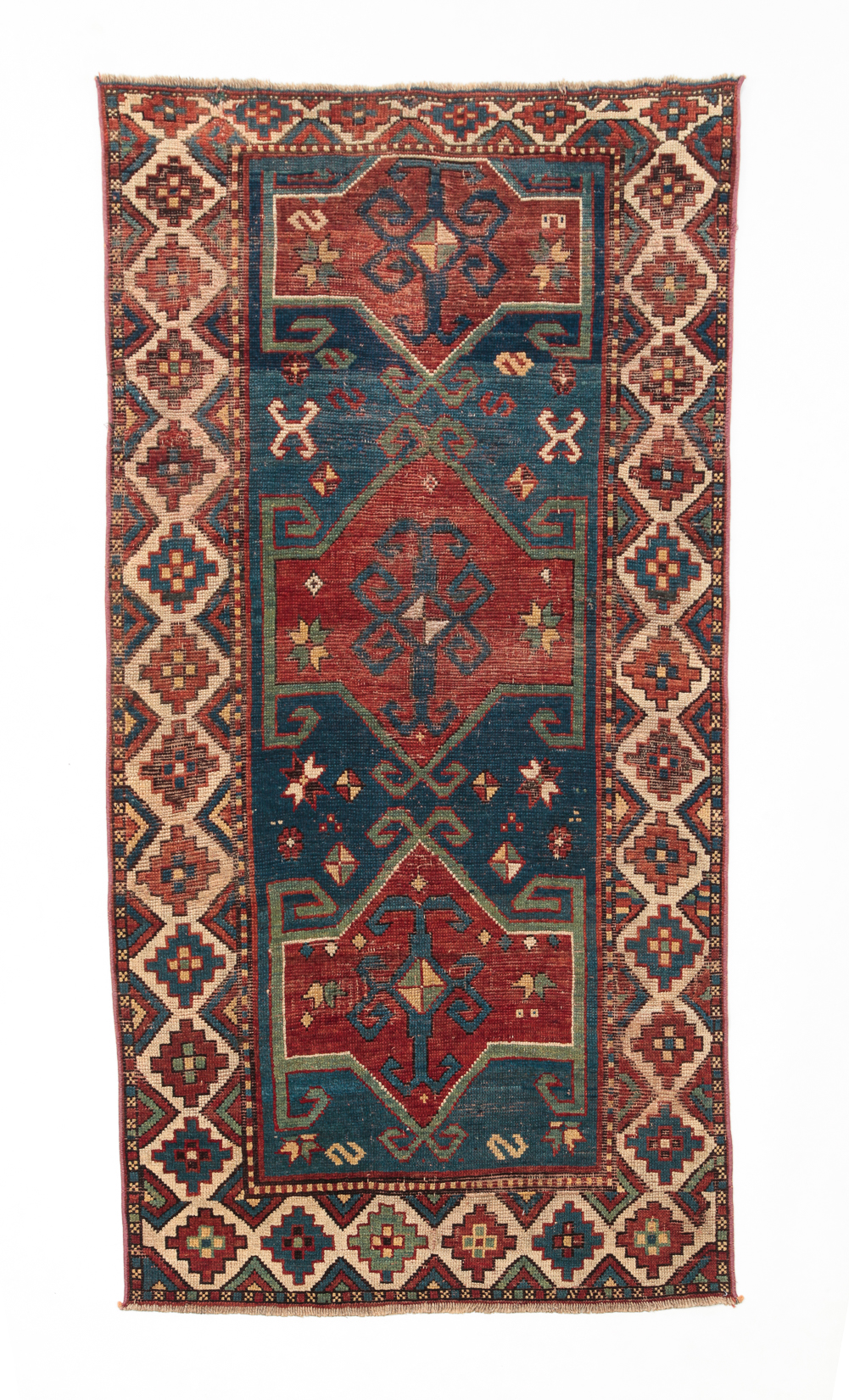 Appraisal: CAUCASIAN KAZAK RUG Early th century Three red medallions on