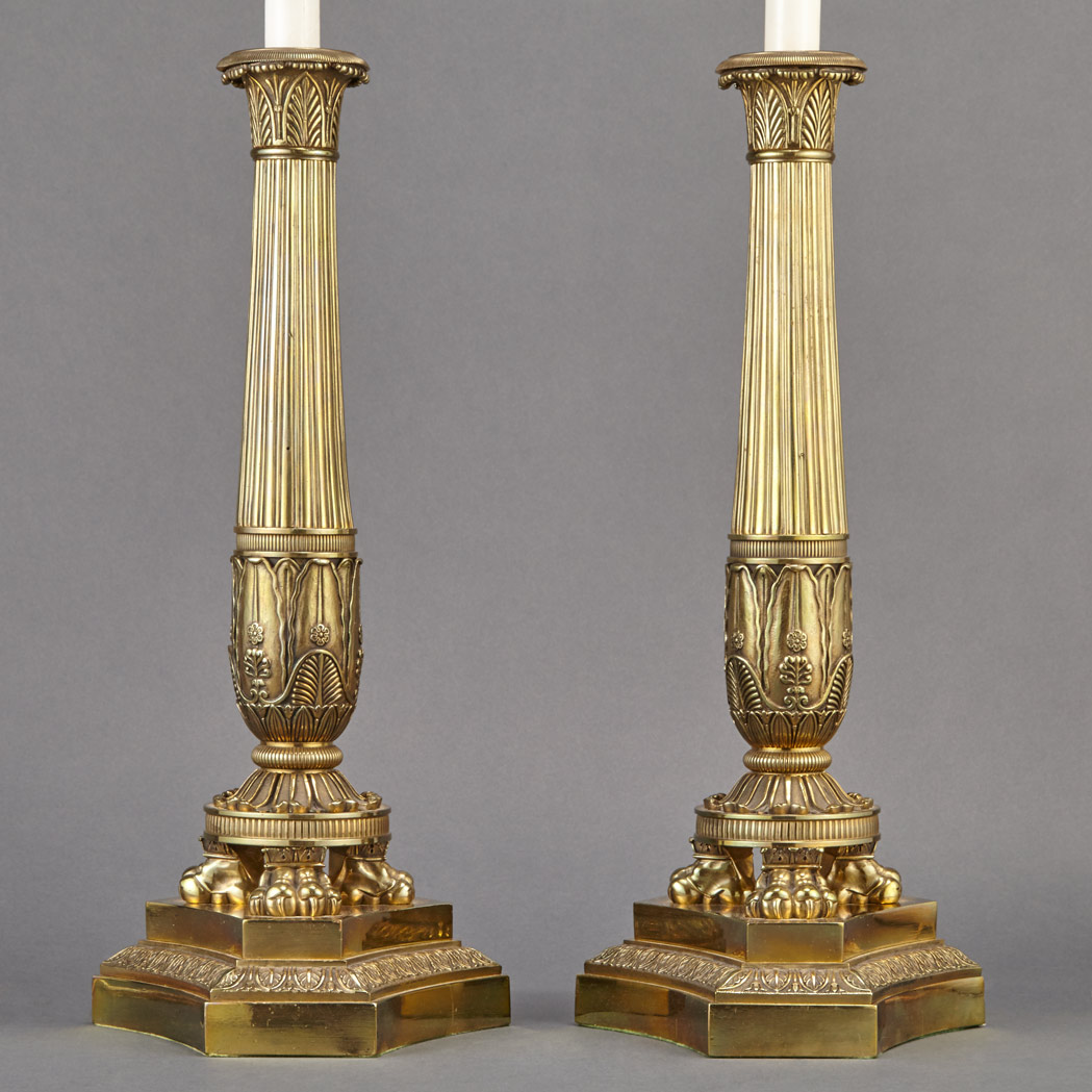 Appraisal: Pair of Empire Style Brass Candlesticks Each flaring standard on